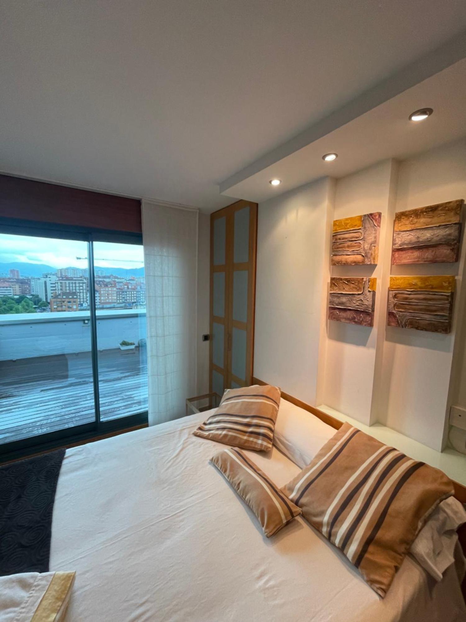 Apartamento El Atico De La Playa Parking Gratis Gijón Exterior foto